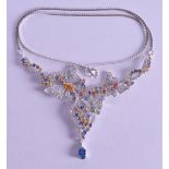 A SILVER MULTI COLOURED SAPPHIRE BUTTERFLY NECKLACE.