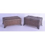 A PAIR OF 19TH CENTURY FRENCH COPPER AND STEEL CASKETS modelled in the Medieval style, depicting