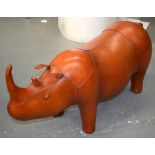 .AN UNUSUAL LARGE COWHIDE LEATHER RHINOCEROS FOOTSTOOL. 48 cm x 87 cm.