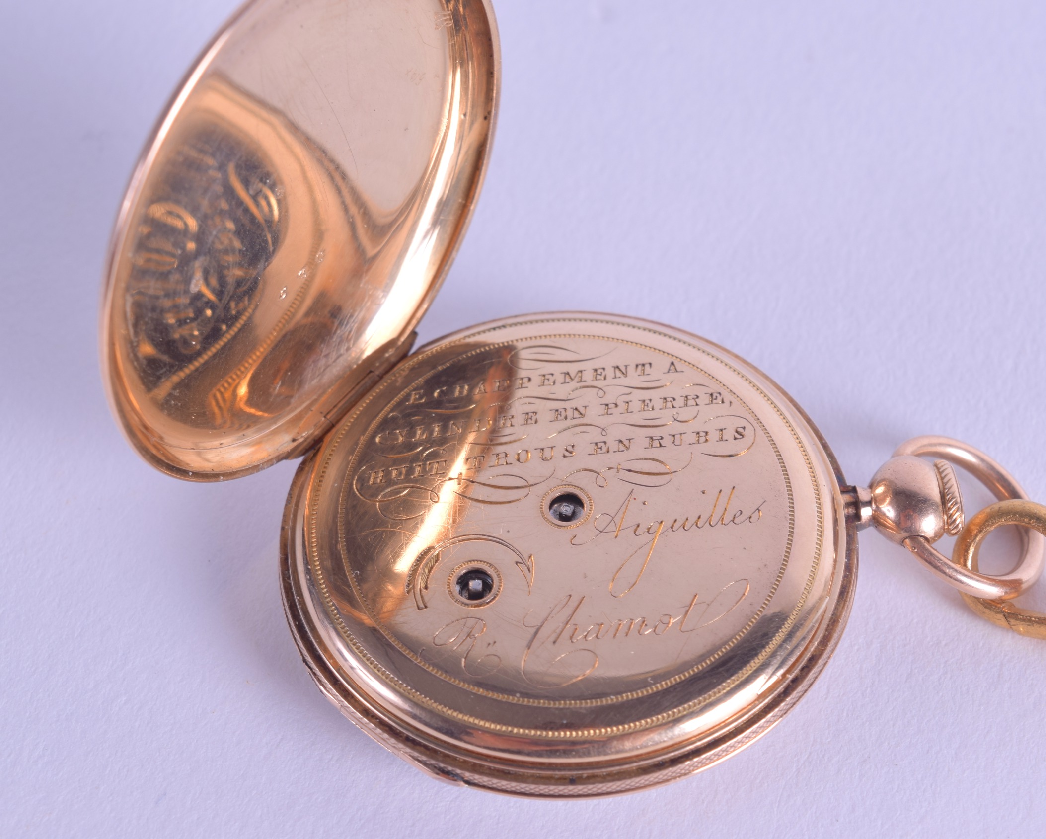 A SMALL 18CT GOLD REPEATING TRAVELLING WATCH with silver dial and black numerals. 44.2 grams - Image 2 of 3