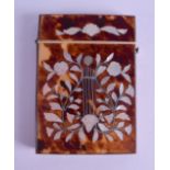 A VICTORIAN MOTHER OF PEARL INLAID TORTOISESHELL CARD CASE decorated with foliage and vines. 7.5