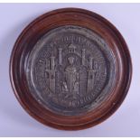 A 19TH CENTURY MAHOGANY CASED WAX SEAL depicting a medieval type scene. Seal 11.25 cm diameter.