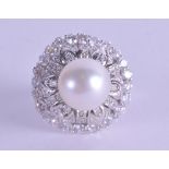 AN 18CT WHITE GOLD GEM SET PEARL CLUSTER RING. Size L.