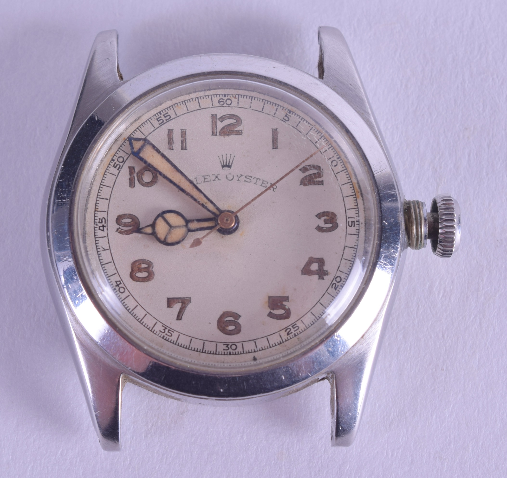 A VINTAGE ROLEX OYSTER STAINLESS STEEL WATCH DIAL AND MOVEMENT with circular face and gilt numerals.