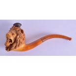 AN ANTIQUE LEATHER CASED CARVED MEERSCHAUM PIPE in the form of a lions head with amber mounts. 16 cm