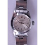 A LADIES ROLEX OYSTER PERPETUAL WRISTWATCH with stainless steel strap. Dial 2.5 cm diameter. Q