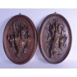 A GOOD LARGE PAIR OF 19TH CENTURY BAVARIAN BLACK FOREST CARVED WOOD PANELS depicting dead game