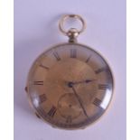 AN ANTIQUE YELLOW METAL POCKET WATCH with gilt dial and black numerals. 4.5 cm diameter.