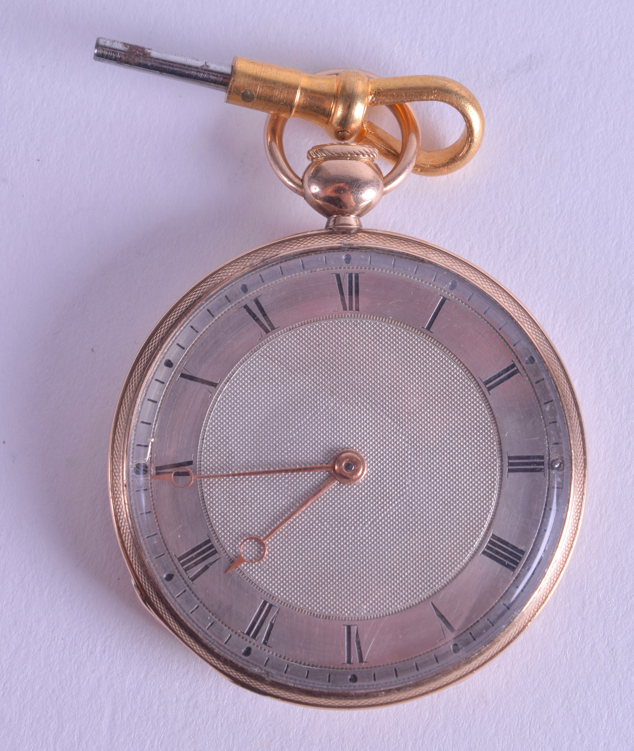 A SMALL 18CT GOLD REPEATING TRAVELLING WATCH with silver dial and black numerals. 44.2 grams