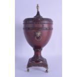 A LATE 19TH CENTURY CONTINENTAL CARVED WOODEN URN AND COVER engraved with flowers and circular