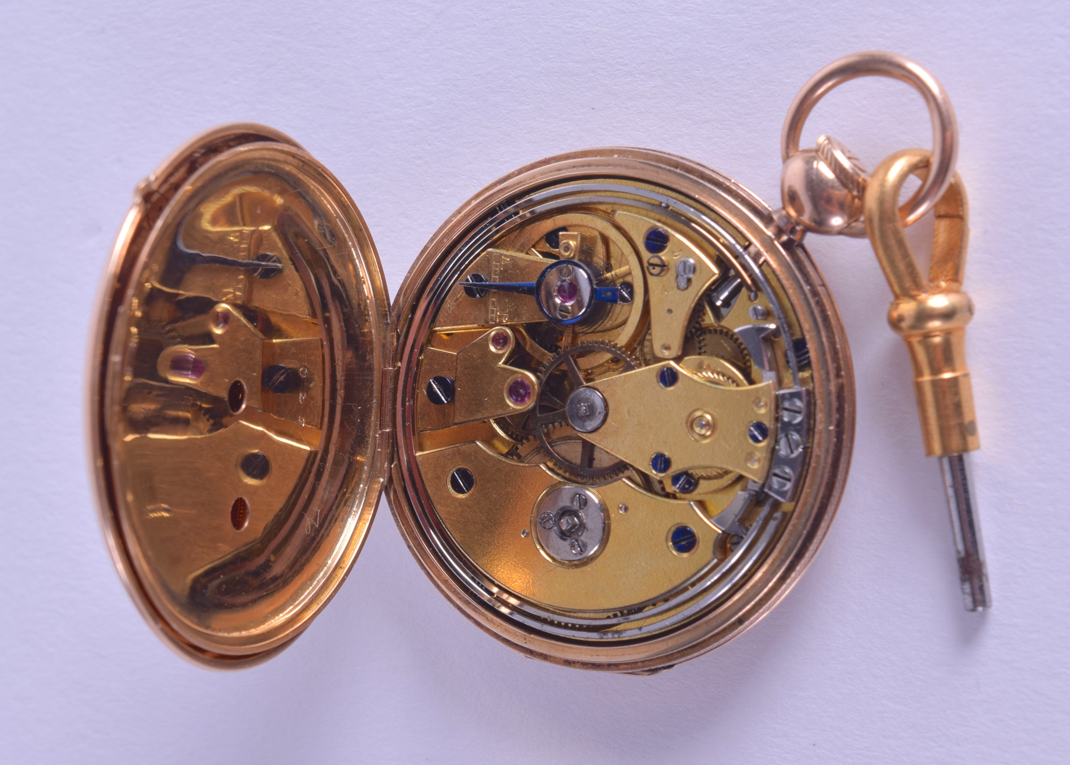 A SMALL 18CT GOLD REPEATING TRAVELLING WATCH with silver dial and black numerals. 44.2 grams - Image 3 of 3