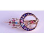 A LARGE ANTIQUE YELLOW GOLD AND AMETHYST BROOCH. 3.25 cm wide.