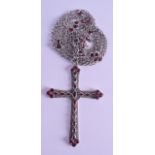 A LARGE SILVER AND GARNET CRUCIFIX NECKLACE.