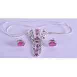 A PAIR OF SILVER AND RUBY EARRINGS together with matching necklace. (3)