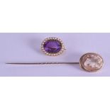 A LATE VICTORIAN YELLOW METAL CAMEO TIE PIN together with an antique gold and amethyst brooch. (2)