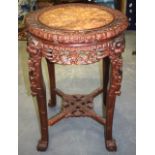 A LARGE EARLY 20TH CENTURY CHINESE MARBLE INSET HARDWOOD STAND, with carved foliate frieze. 81 cm
