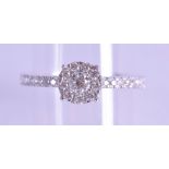 A 9CT GOLD DIAMOND SOLITAIRE RING. Size N.