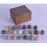 AN UNUSUAL BOXED OF HARDSTONE SPECIMAN EGGS in various forms and sizes. (qty)