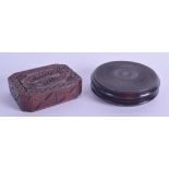 TWO ANTIQUE CARVED WOODEN SNUFF BOXES. Both 8 cm wide. (2)