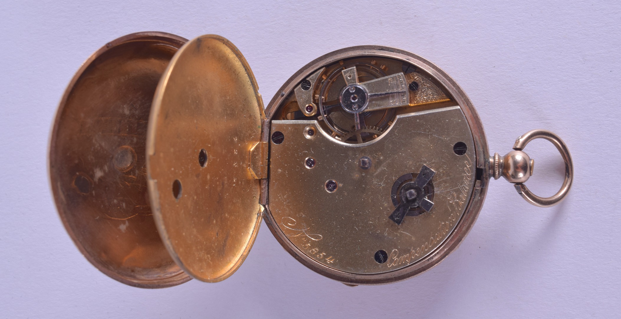 AN ANTIQUE YELLOW METAL POCKET WATCH with gilt dial and black numerals. 4.5 cm diameter. - Image 2 of 2