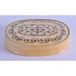 AN 18TH CENTURY CONTINENTAL CARVED IVORY PIQUE WORK SNUFF BOX the lid rising to reveal a painted