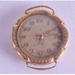 A VINTAGE 14CT GOLD WATCH DIAL. 8.1 grams. 2.25 cm wide.