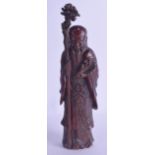 AN 18TH CENTURY CHINESE CARVED BAMBOO FIGURE OF SAGE Qianlong/Jiaqing, modelled holding a lingzhi