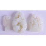 A GROUP OF THREE CHINESE GREENISH WHITE JADE CARVINGS two of figural form, the other a