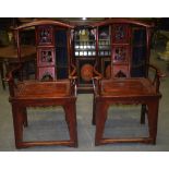 A PAIR OF EARLY 20TH CENTURY CHINESE CARVED OFFICIAL'S HAT CHAIRS, the backsplat carved with