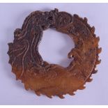 AN UNUSUAL CHINESE QING DYNASTY CARVED JADE BI DISC Song style, modelled as a stylised dragon with