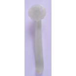 A CHINESE CARVED GREEN JADE RUI SCEPTRE probably late Qing, decorated with floral sprays and