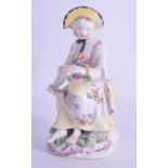 18th c. Bow figure of a girl seated with a basket of grapes on a scroll moulded mound base, 13cm