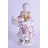 18th c. Bow good figure of a girl holding a bucket of flowers and more flowers in her apron standing