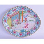 A MID 19TH CENTURY CHINESE CANTON FAMILLE ROSE OVAL DISH painted with a figure performing within
