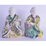 A PAIR OF 17TH CENTURY CHINESE FAMILLE VERTE FIGURES OF IMMORTALS Late Kangxi, painted with