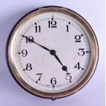 A 1930S BRASS AND BAKELITE CIRCULAR WALL CLOCK with black numerals. 16.5 cm diameter.