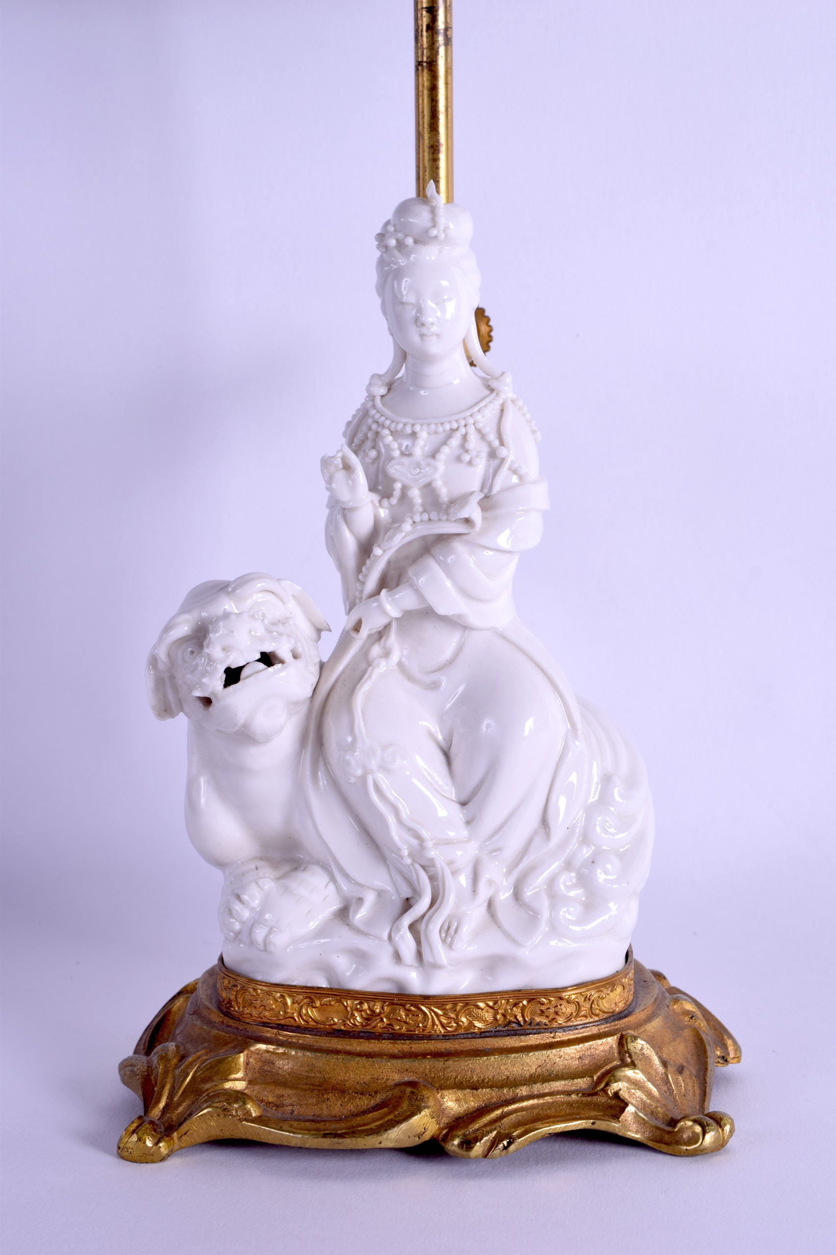 AN EARLY 20TH CENTURY CHINESE BLANC DE CHINE PORCELAIN FIGURE OF GUANYIN converted to a lamp, - Image 2 of 3