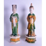 A GOOD PAIR OF CHINESE MING DYNASTY SANCAI GLAZED ATTENDANTS the male wearing flowing robes, the