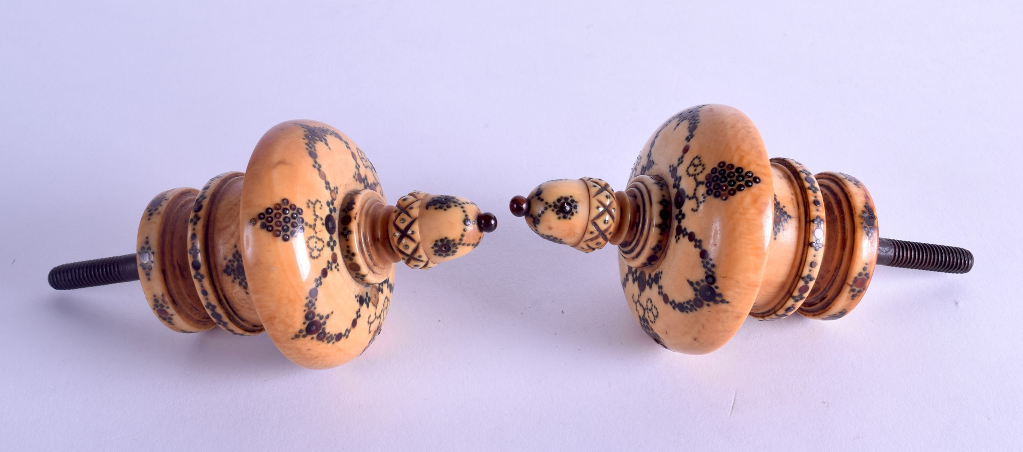 A PAIR OF EARLY 18TH CENTURY ENGLISH PIQUE WORK CARVED IVORY HANDLE PULLS decorated with drapes - Image 2 of 2