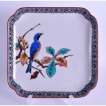 A SMALL 19TH CENTURY JAPANESE MEIJI PERIOD AO KUTANI PORCELAIN DISH painted with a bird amongst