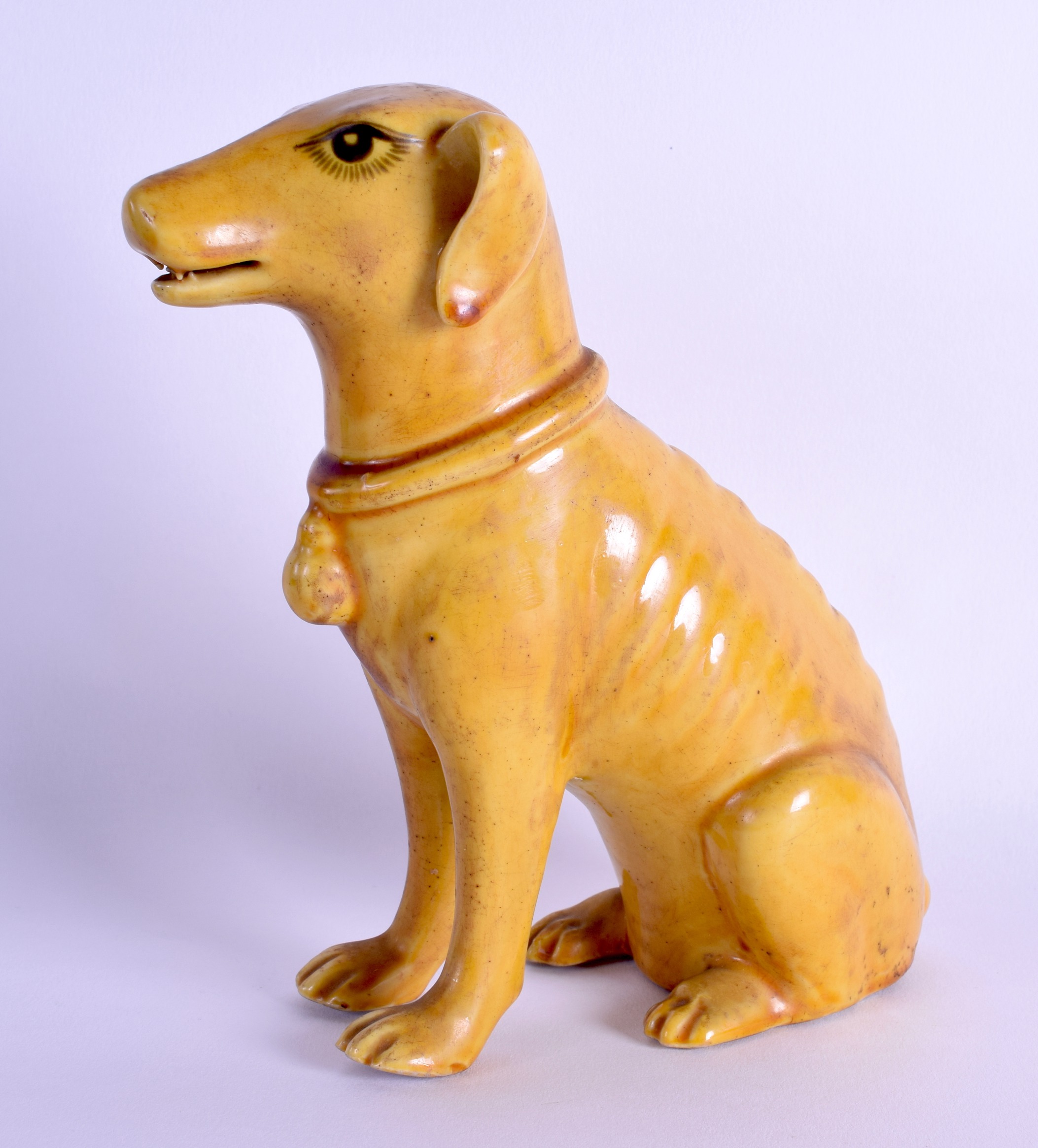 A 19TH CENTURY CHINESE YELLOW GLAZED FIGURE OF A HOUND Kangxi style, modelled standing on its - Image 2 of 3