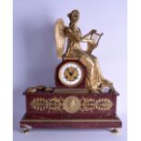 A LARGE 19TH CENTURY FRENCH GILT BRONZE AND RED MARBLE MANTEL CLOCK modelled as a seated classical