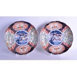 A PAIR OF 19TH CENTURY JAPANESE MEIJI PERIOD IMARI PLATES painted with flowers, birds and