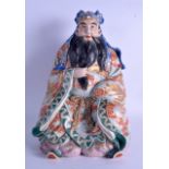 A GOOD 19TH CENTURY JAPANESE MEIJI PERIOD SATSUMA FIGURE OF A SEATED SCHOLAR modelled in dragon