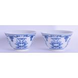 A PAIR OF CHINESE BLUE AND WHITE TEABOWLS 20th Century, painted with stylised flowers. 6.75 cm