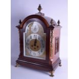 A LARGE EDWARDIAN MAHOGANY BRACKET CLOCK with pineapple brass finials, the dial with engraved