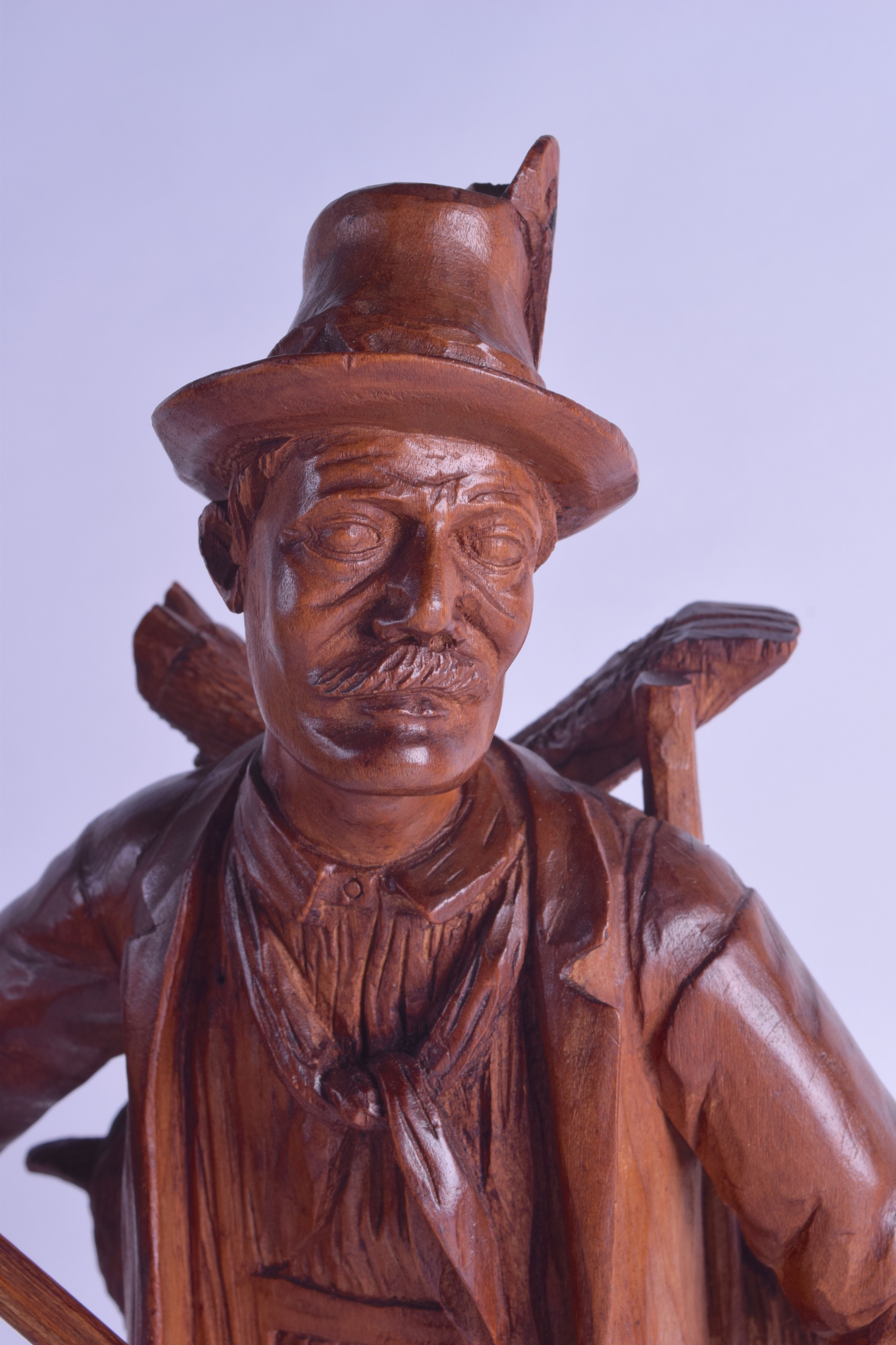 A LARGE EARLY 20TH CENTURY BAVARIAN BLACK FOREST FIGURE OF A HUNTER modelled upon a naturalistic - Image 3 of 3
