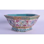AN EARLY 20TH CENTURY CHINESE FAMILLE ROSE OCTAGONAL PORCELAIN DISH painted with flowers and