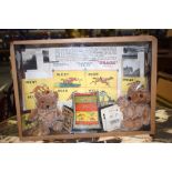 AN EARLY 20TH CENTURY DIORAMA, depicting two bears surrounded by a vintage horse racing game. 25