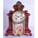AN EARLY 20TH CENTURY FRENCH POTTERY MANTEL CLOCK painted with two figures roaming within a